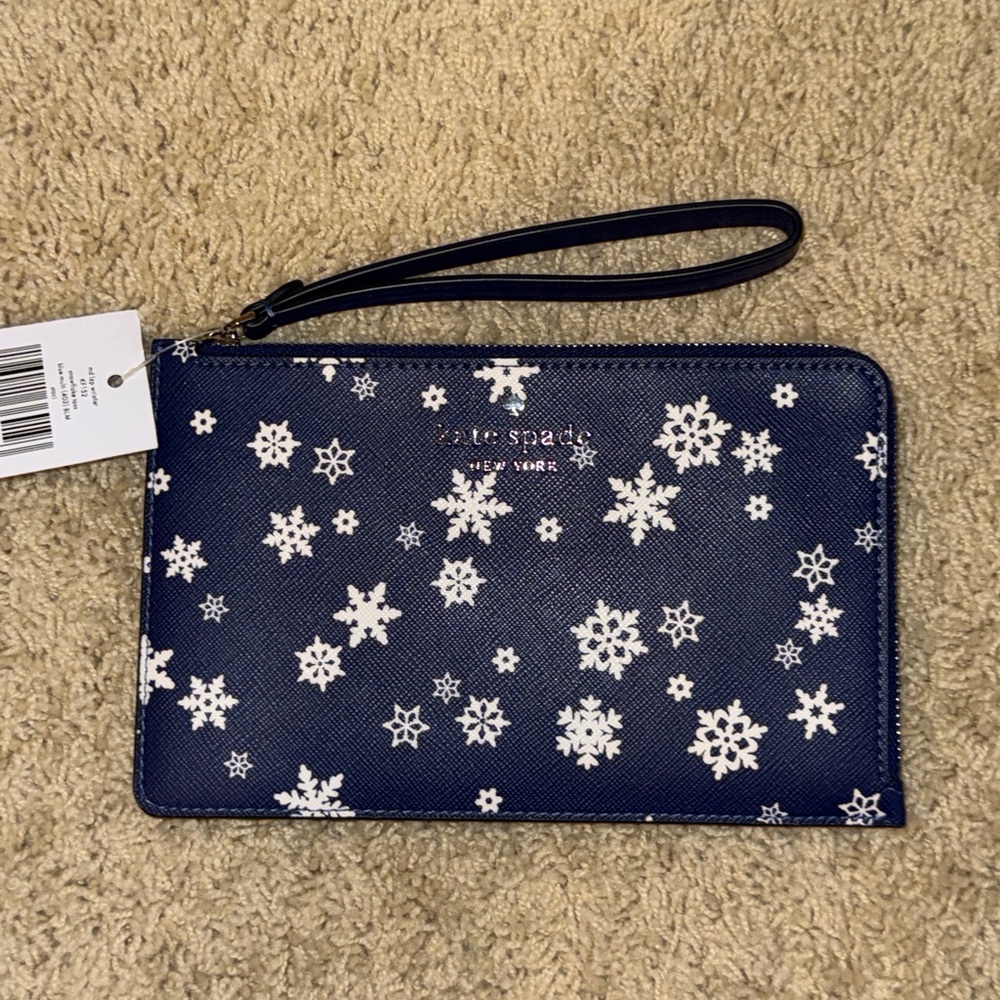kate spade Blue Wristlet with White Snowflakes